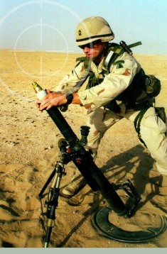 United States Army Soldier firing M224 60mm lightweight mortars during training excercises for Operation Iraqi Freedom. M-224 60mm lightweight mortars can be stored in Combat Weapons Storage Racks.